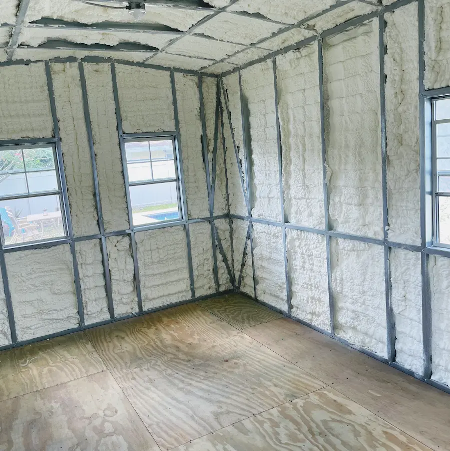 Closed-cell spray foam insulation applied to wall cavities in a residential project in Spring Valley